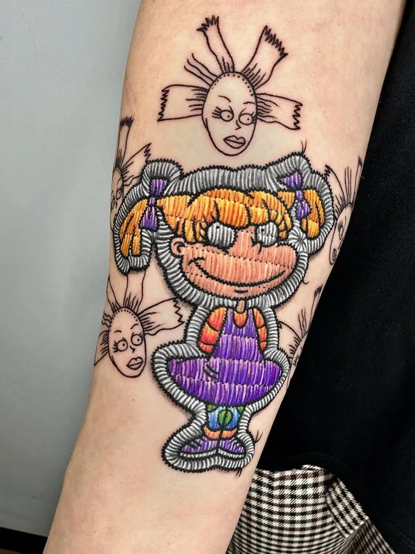 color cartoon tatuaje en forearm #68410 | Tatuador muslubash