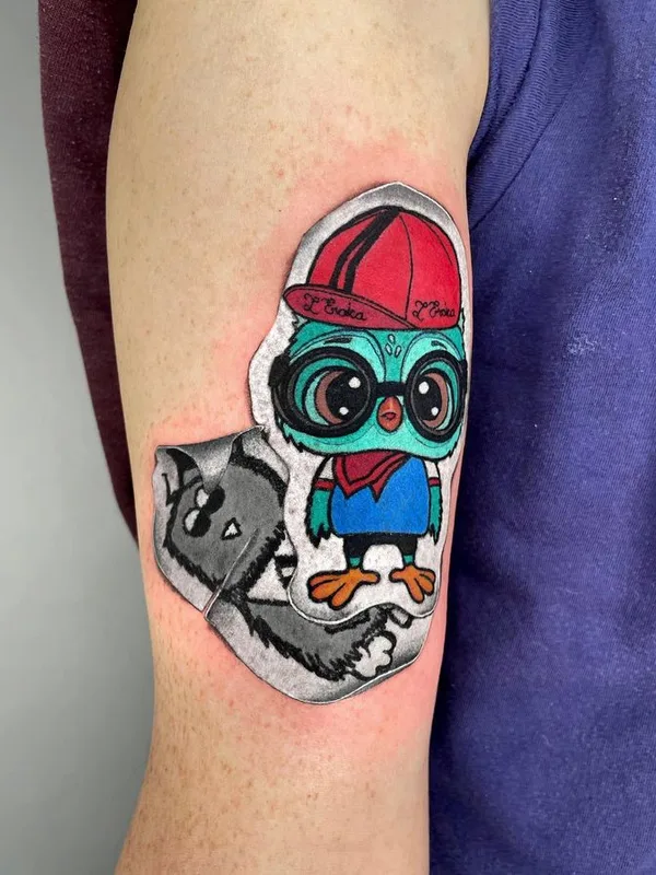 color cartoon tatuaje en bicep #68412 | Tatuador muslubash