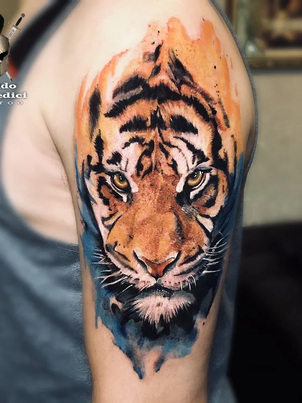 color watercolor tatuaje en upper arm #68549 | Tatuador Guido de Medici