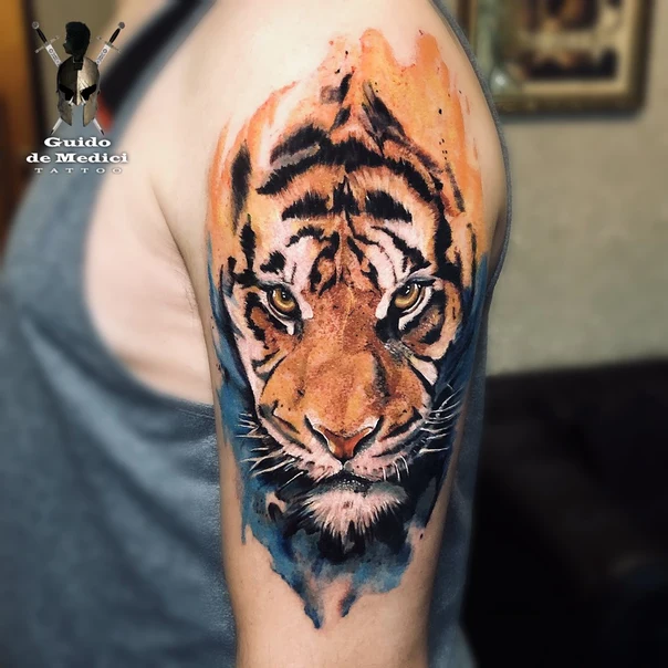 Watercolor Tiger tattoo on Upper Arm