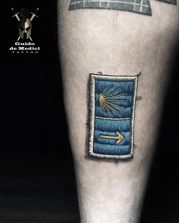 Illustrative Arrow, Sun tattoo on Calf