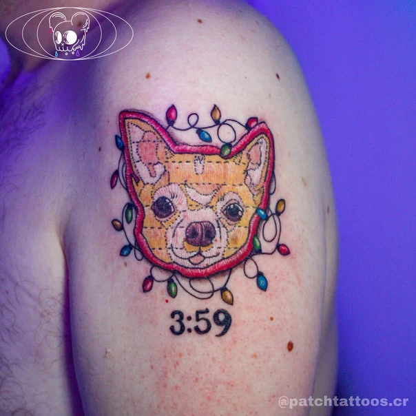 Illustrative Dog, Christmas lights tattoo on Shoulder
