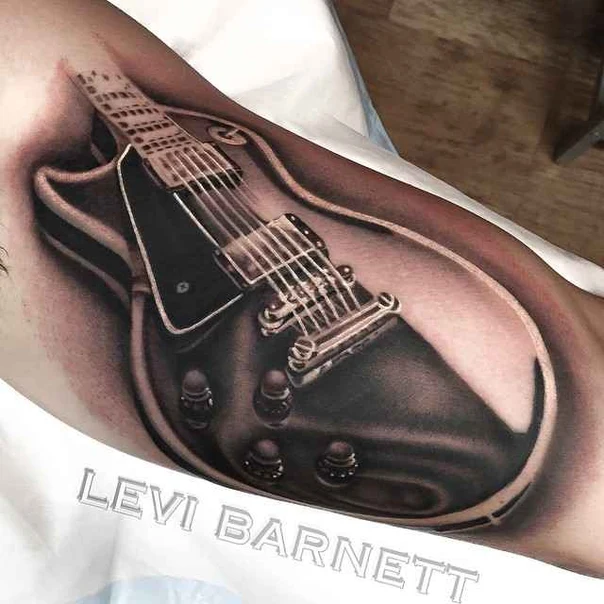 Realism Guitar tattoo on Forearm
