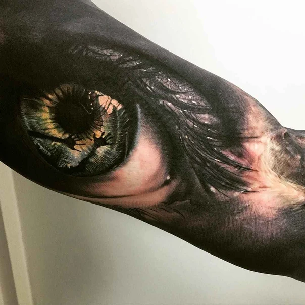 Realism Eye, Feather tattoo on Forearm