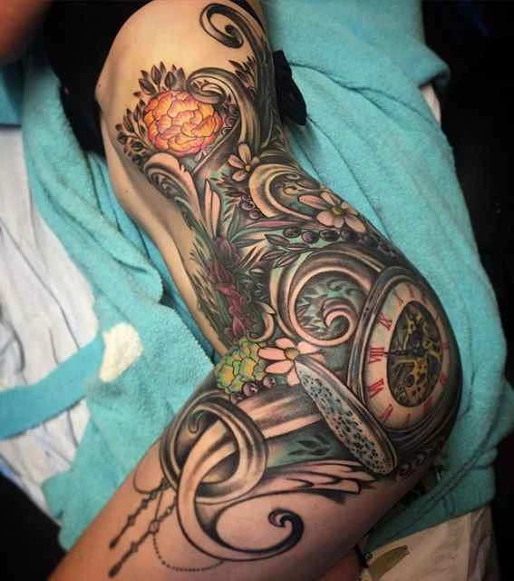 Illustrative Flowers, Clock tattoo on Thigh