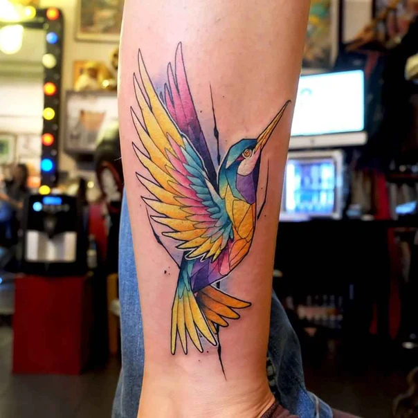 Illustrative Hummingbird tattoo on Forearm