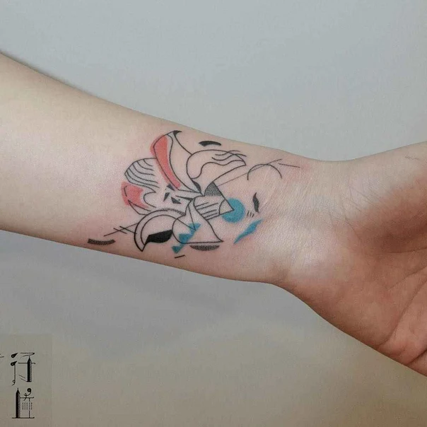 Abstract Flower tattoo on Wrist