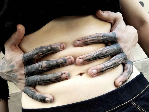 Blackwork Hands tattoo on Stomach