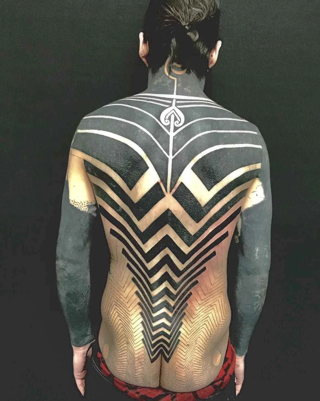 Tattoo artist Matt Black, black ornamental tattoo | USA