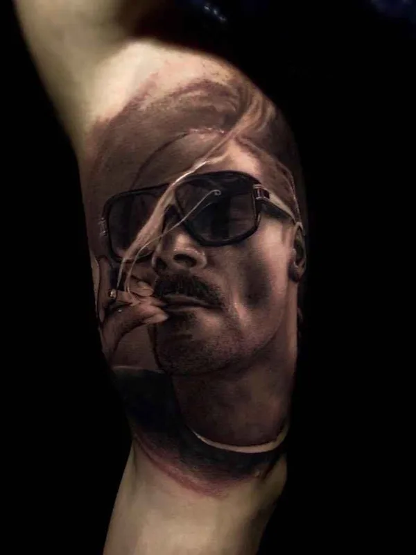 male black and grey realism tattoo on outer arm #20618 | Tattoo Artist Ganga