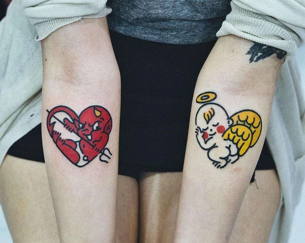 Cartoon Devil, Angel tattoo on Forearm