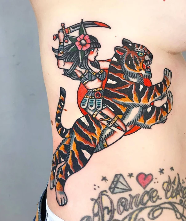 Traditional Tiger, Woman tattoo on Ribcage