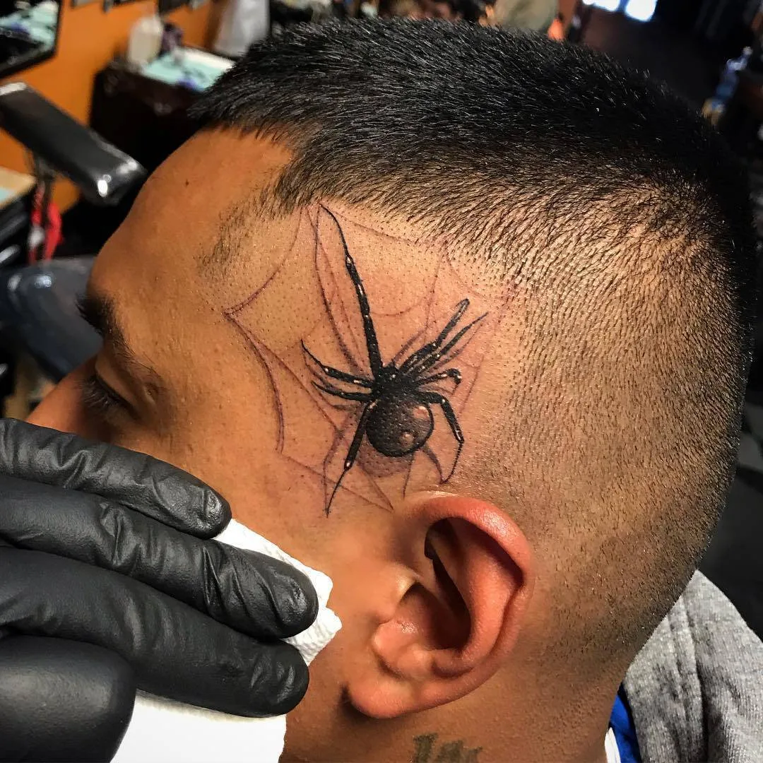 Tattoo artist Jesse Garcia, black and grey realistic spider tattoo | USA
