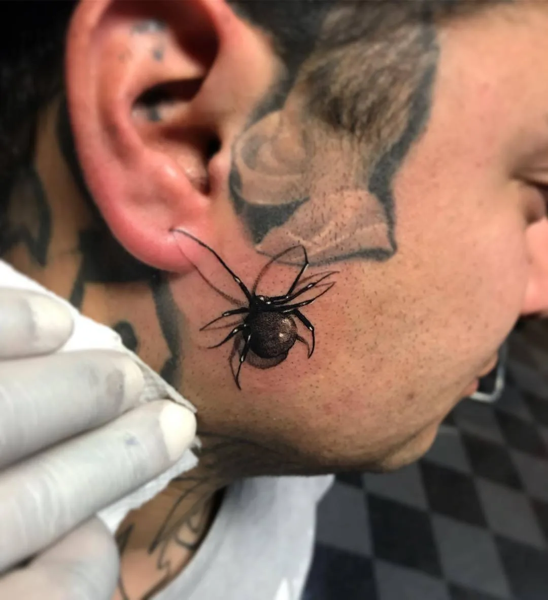Tattoo artist Jesse Garcia, black and grey realistic spider tattoo | USA