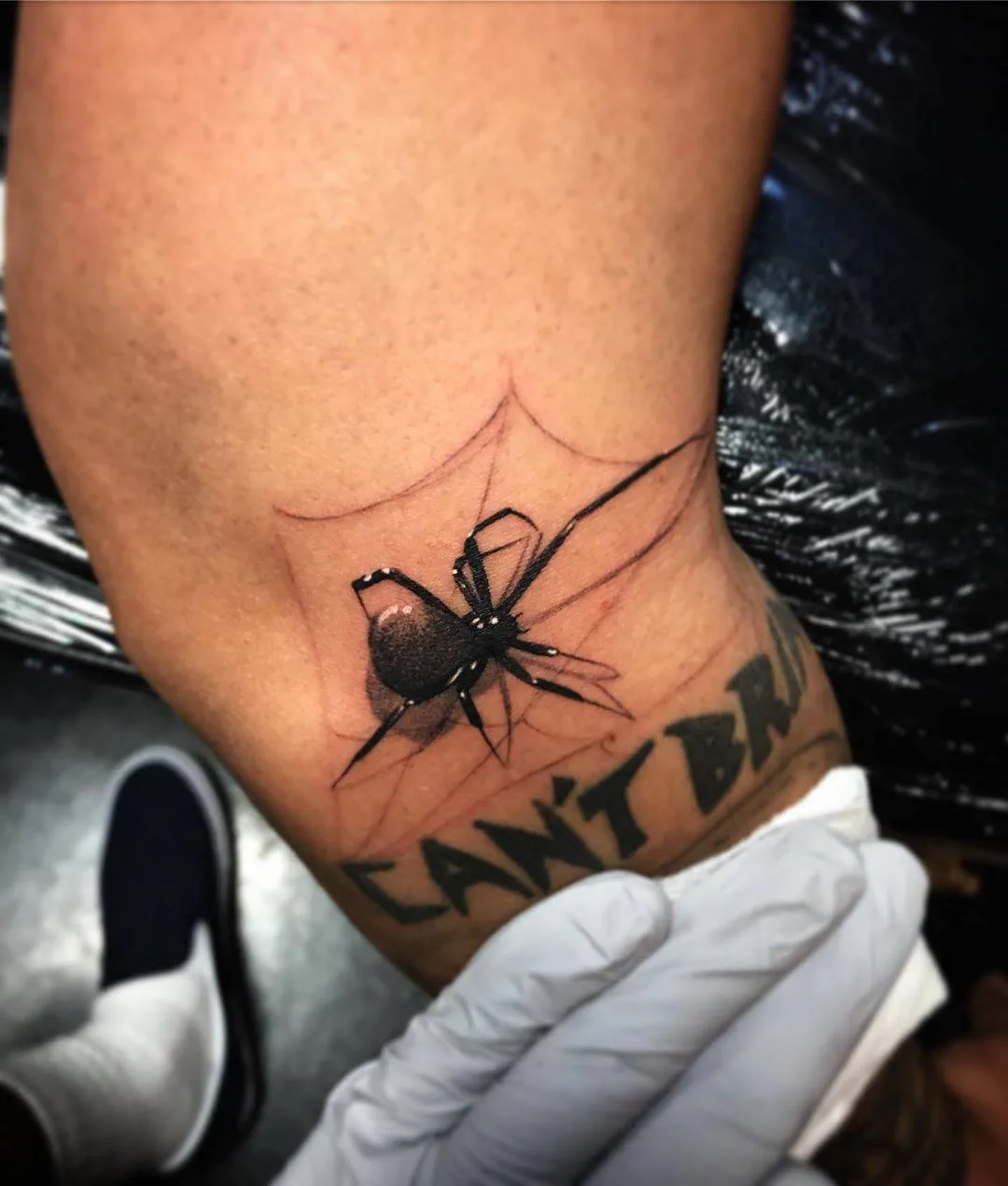 Tattoo artist Jesse Garcia, black and grey realistic spider tattoo | USA