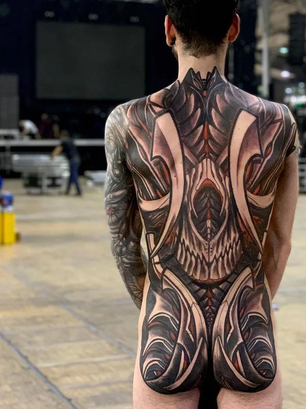 male black and grey biomechanical tattoo on full back #30495 | Tattoo Artist Javier Obregon