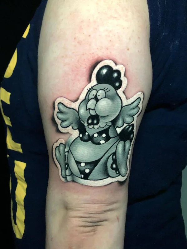 black and grey cartoon 纹身 在 bicep #30795 | 纹身师 Luke Cormier