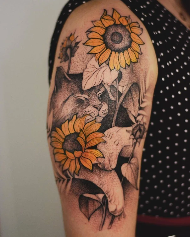 Illustrative Sunflower, Lion tattoo on Upper Arm