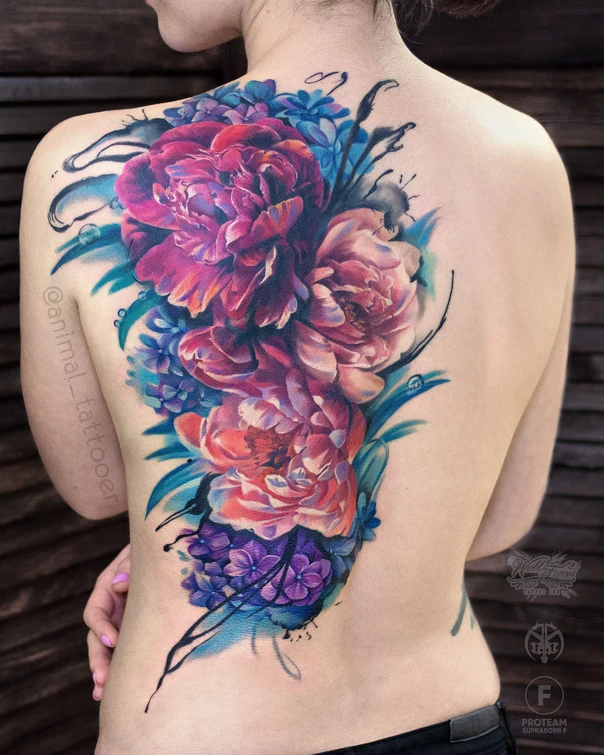 Watercolor Flowers tattoo on Upper Back