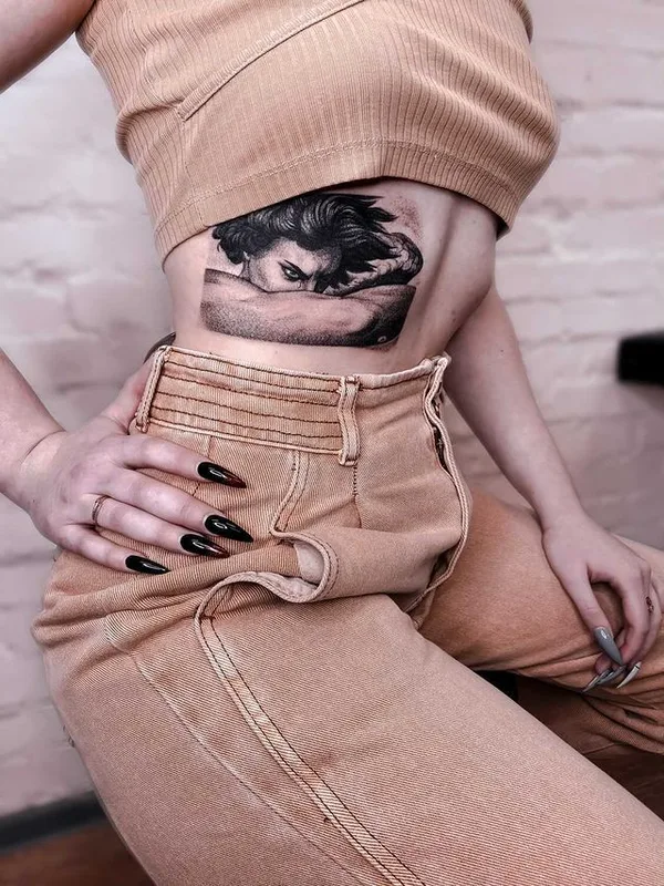 female black and grey realism татуировка на ribcage #39915 | Тату мастер Ирина Седова