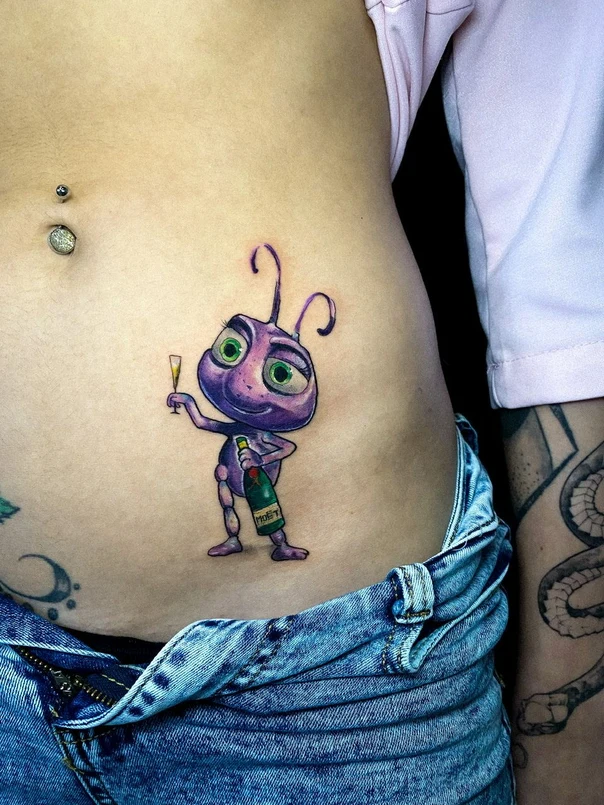 Cartoon Bug, Champagne tattoo на Живот