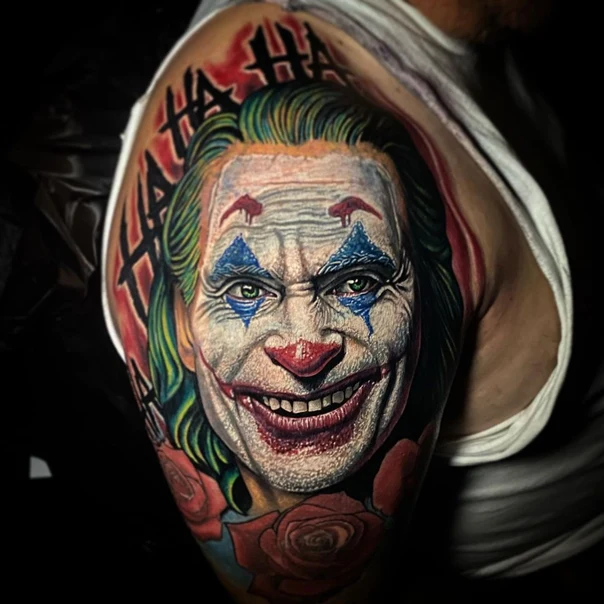 Realism Joker, Roses tattoo on Upper Arm