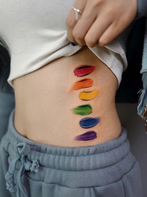 female color watercolor tatuaje en side #40337 | Tatuador Piece