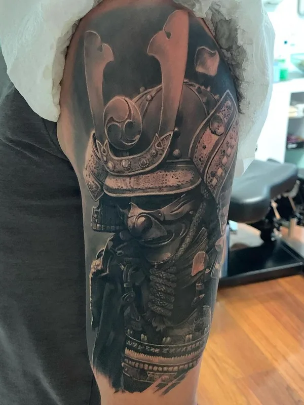 black and grey realism tattoo on upper arm #40349 | Tattoo Artist Chris Hirakawa