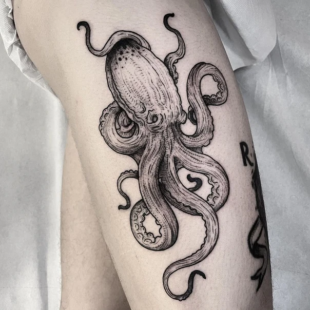Engraving Octopus tattoo on Thigh