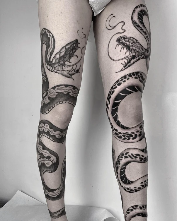 Blackwork Snake tattoo on Full leg