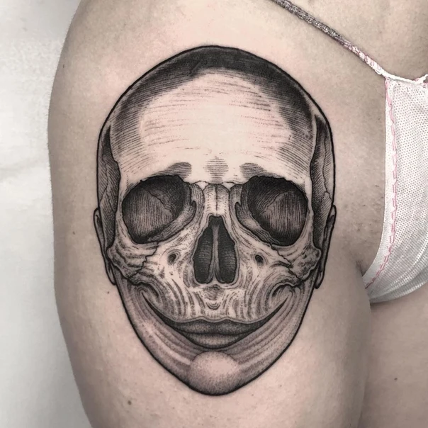 Blackwork Skull tattoo on Thigh