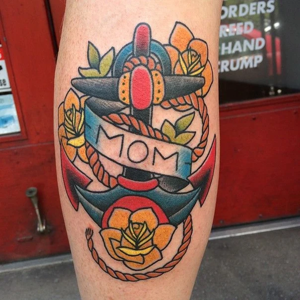 Traditional Anchor, Rose tattoo on Calf