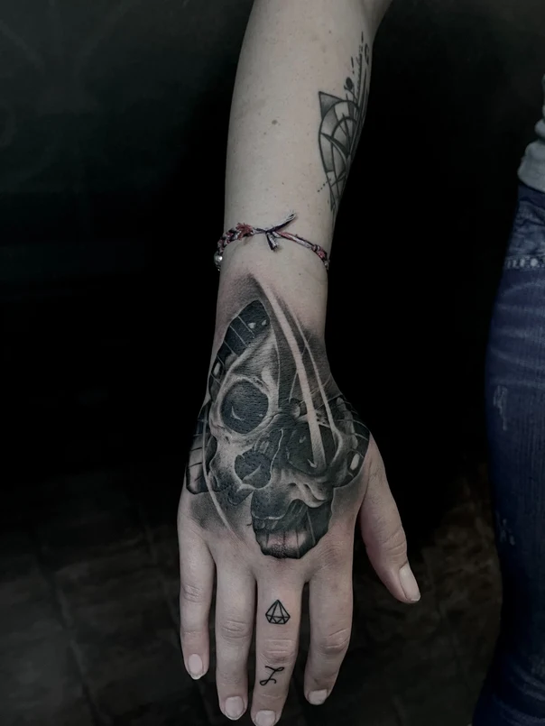 Black & Grey Skull, Geometric tattoo on Hand