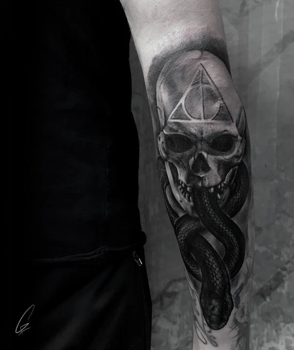 Black & Grey Skull, Snake tattoo on Forearm