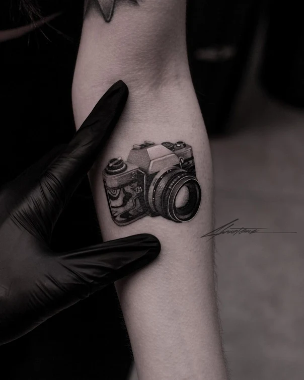 Realism Camera tattoo on Forearm