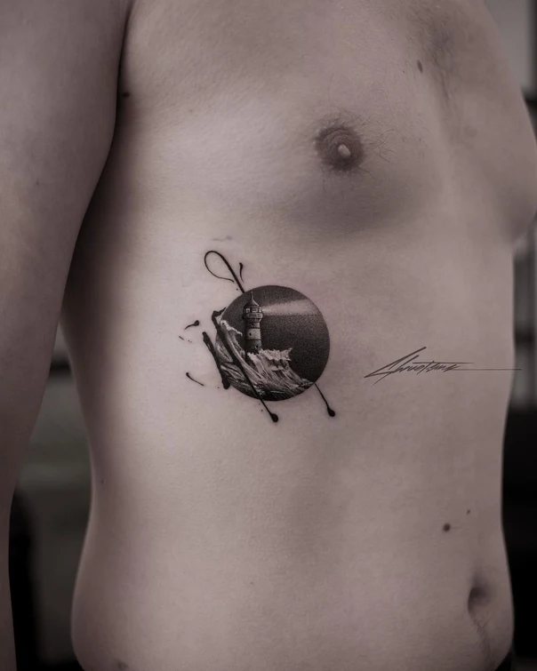 Black & Grey Lighthouse, Ocean tattoo on Ribcage