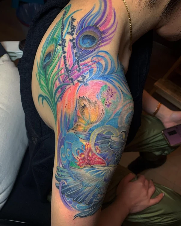 Watercolor Peacock feather, Butterfly tattoo on Upper Arm