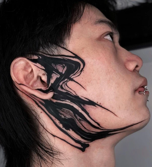 Abstract Abstract tattoo on Face