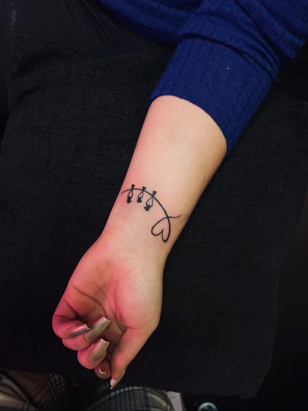 Linework Heart, String lights tattoo on Wrist