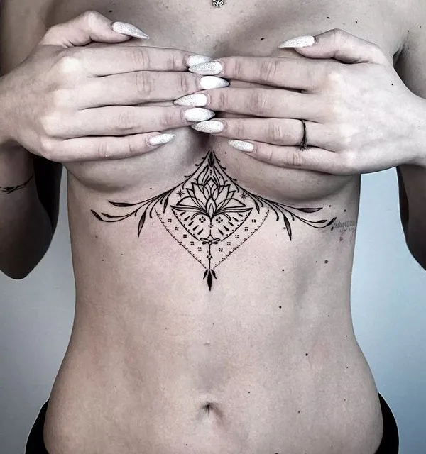 female black ornamental tattoo on sternum #69685 | Tattoo Artist Denis Ryazanov