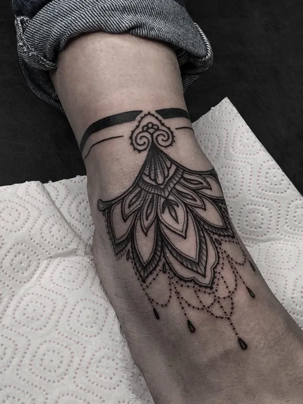 black ornamental tattoo on ankle #69691 | Tattoo Artist Denis Ryazanov