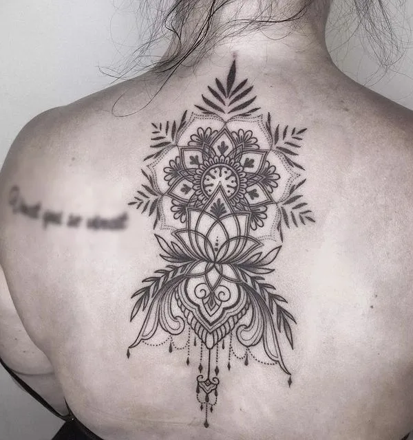 female black and grey ornamental tattoo on upper back #69687 | Tattoo Artist Denis Ryazanov
