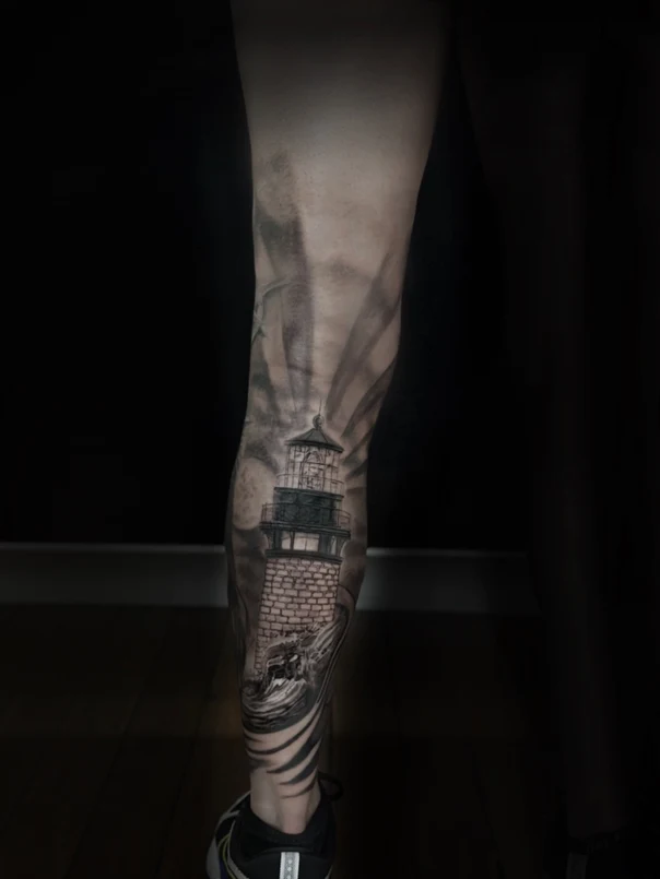 Black & Grey Lighthouse, Waves tattoo on Calf