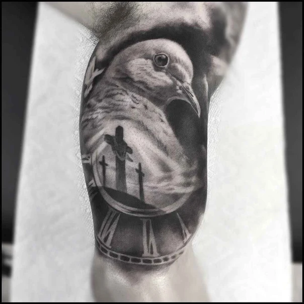 Realism Dove, Cross tattoo on Bicep