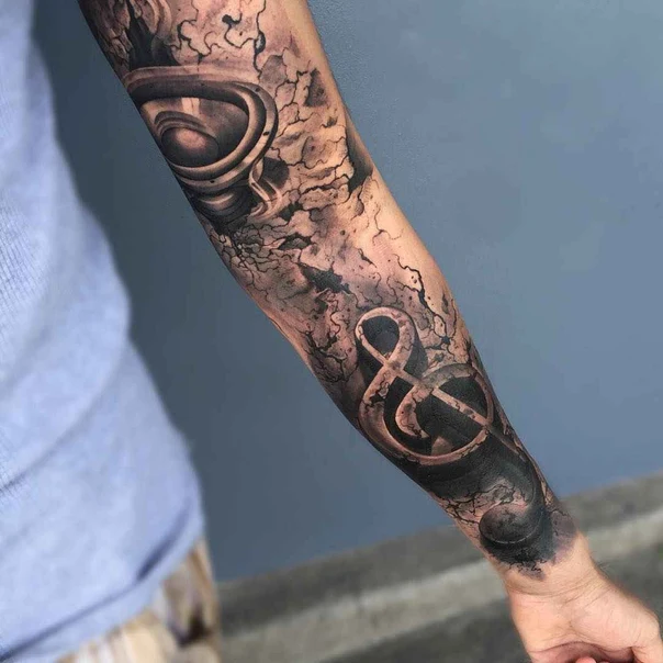 Black & Grey Speaker, Music notes tattoo on Forearm
