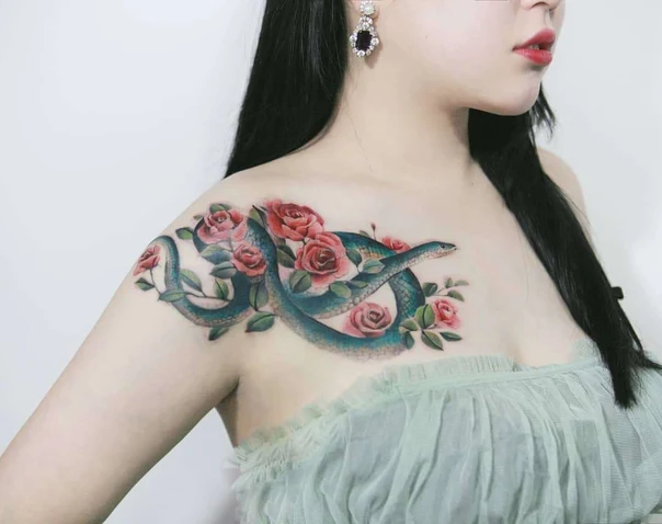 Illustrative Snake, Roses tattoo on Chest