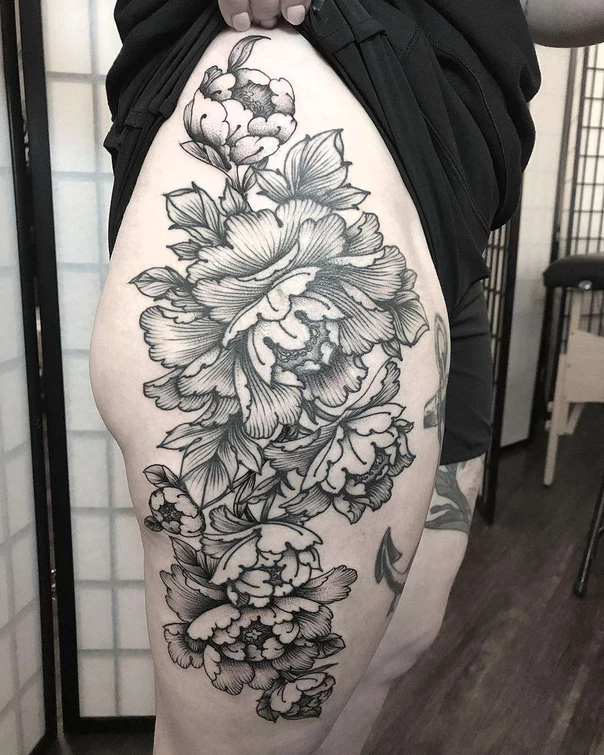 Blackwork Flower tattoo on Thigh