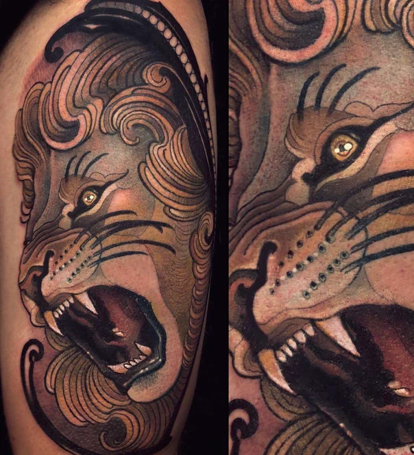 Neo Traditional Lion tattoo on Upper Arm
