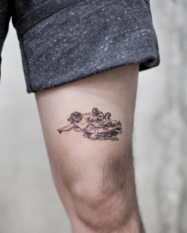 Black & Grey Figure tattoo on Thigh