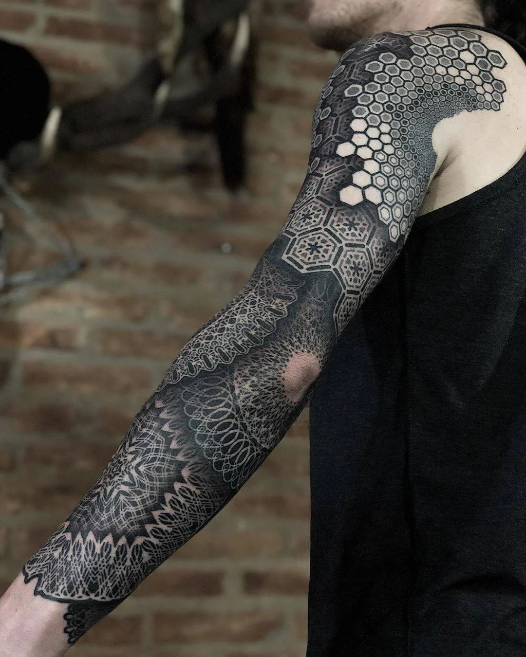 Tattoo artist Eric Stricker, black ornamental large scale tattoo | Buenos Aires, Argentina